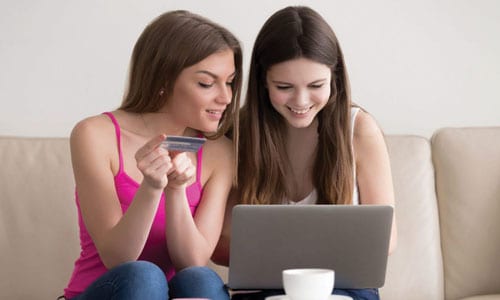 Girls looking at computer