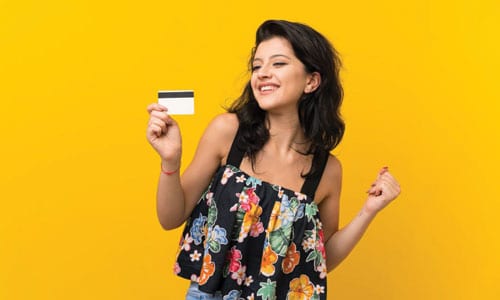 Woman holding credit card