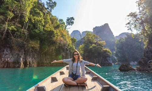 Woman on boat in river